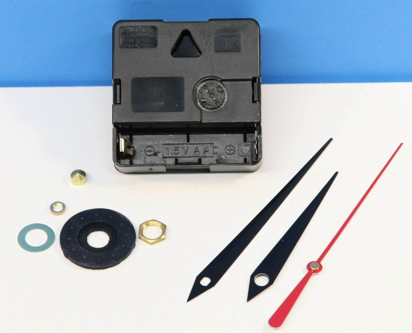 Quartex Backwards Clock Movement Reverse Quartz 1/4" Thick Dial - Sword Hands