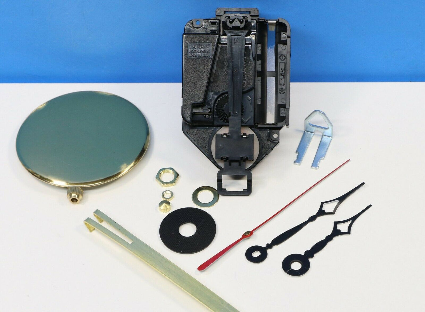 Takane Mini Quartz Clock Movement with Pendulum - Eli Terry Hands