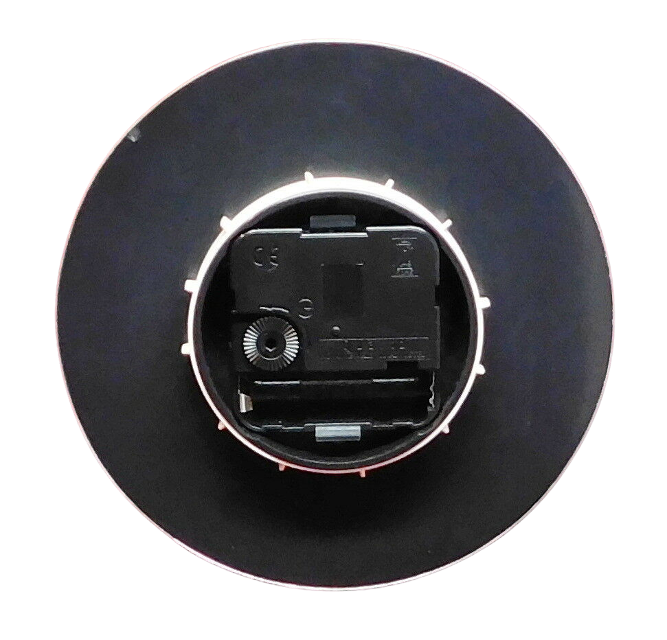 4 1/4 inch quartz insert fit-up clock movement with ivory Roman dial, black spade hands, and gold aluminum bezel