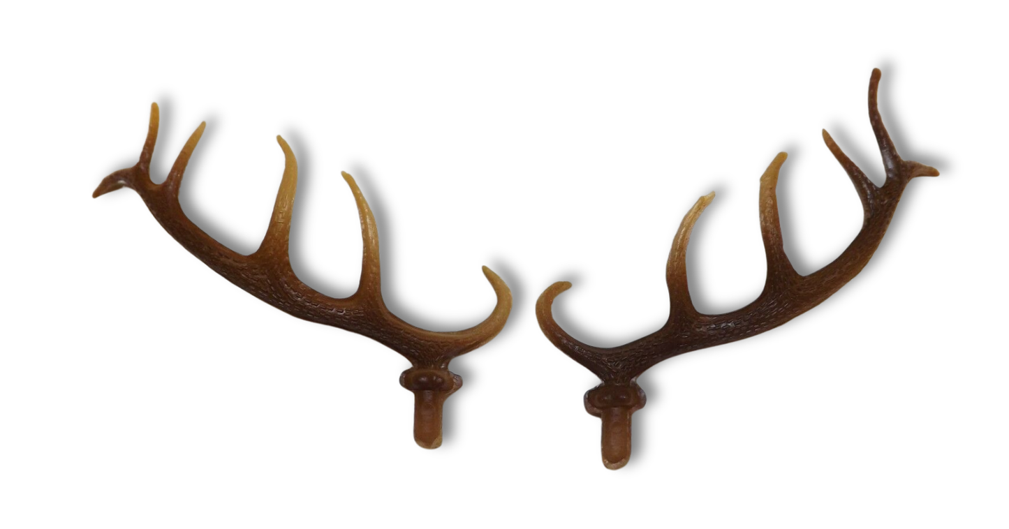 Set of two 4-inch German-made plastic deer antlers for hunter-style cuckoo clocks with realistic finish