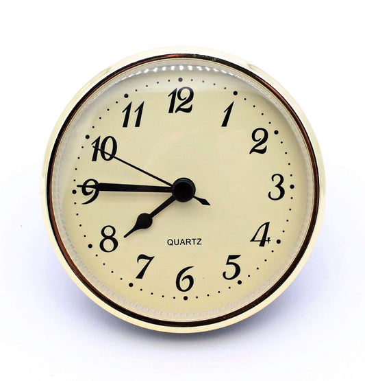 3 1/2 inch quartz clock insert fit-up movement with cream Arabic dial, black spade hands, and gold bezel